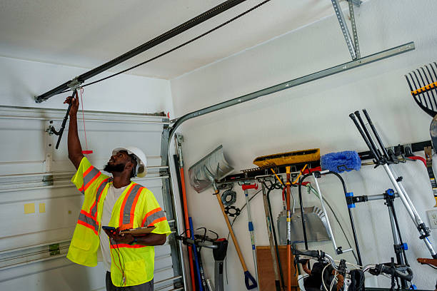 Professional Garage Door Maintenance technician working in White Oak, MS
